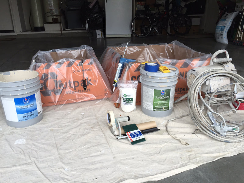 Setup of materials for use in a painting operation. 