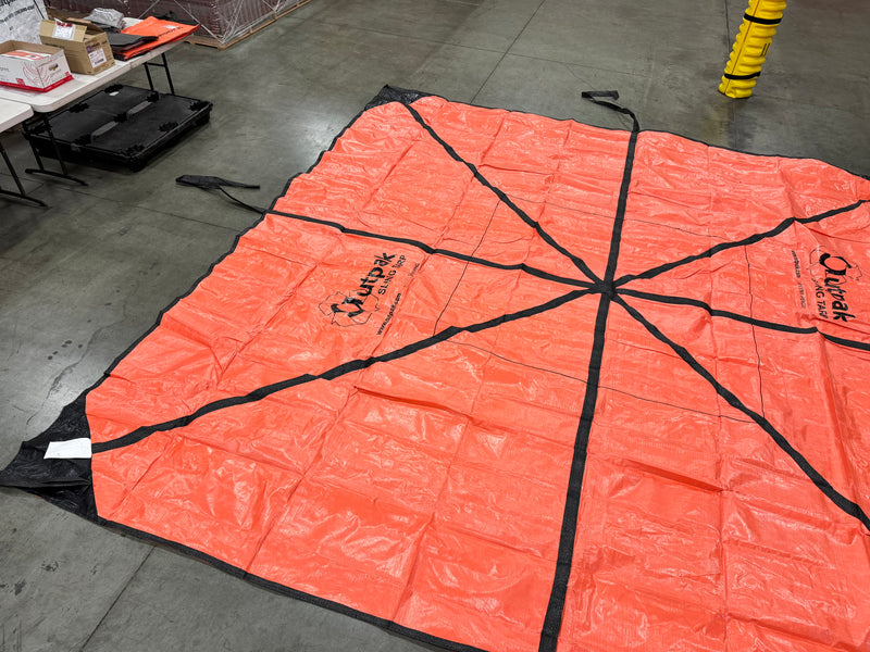 Sling Tarp laid out on the floor. 